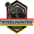 SH_DE emblem