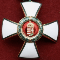 H-E-C emblem