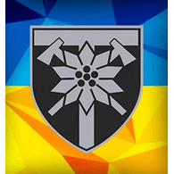 128AB emblem