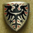 TBC-M emblem