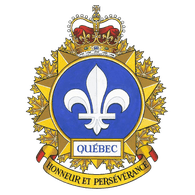 QC-S emblem
