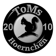 __TOM emblem